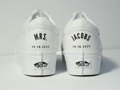 White platform Vans wedding sneakers, shown in a close-up side view