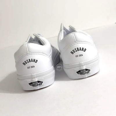 Wedding Custom white Vans sneakers with “Husband.” lettering on the heel, designed as groom shoes.